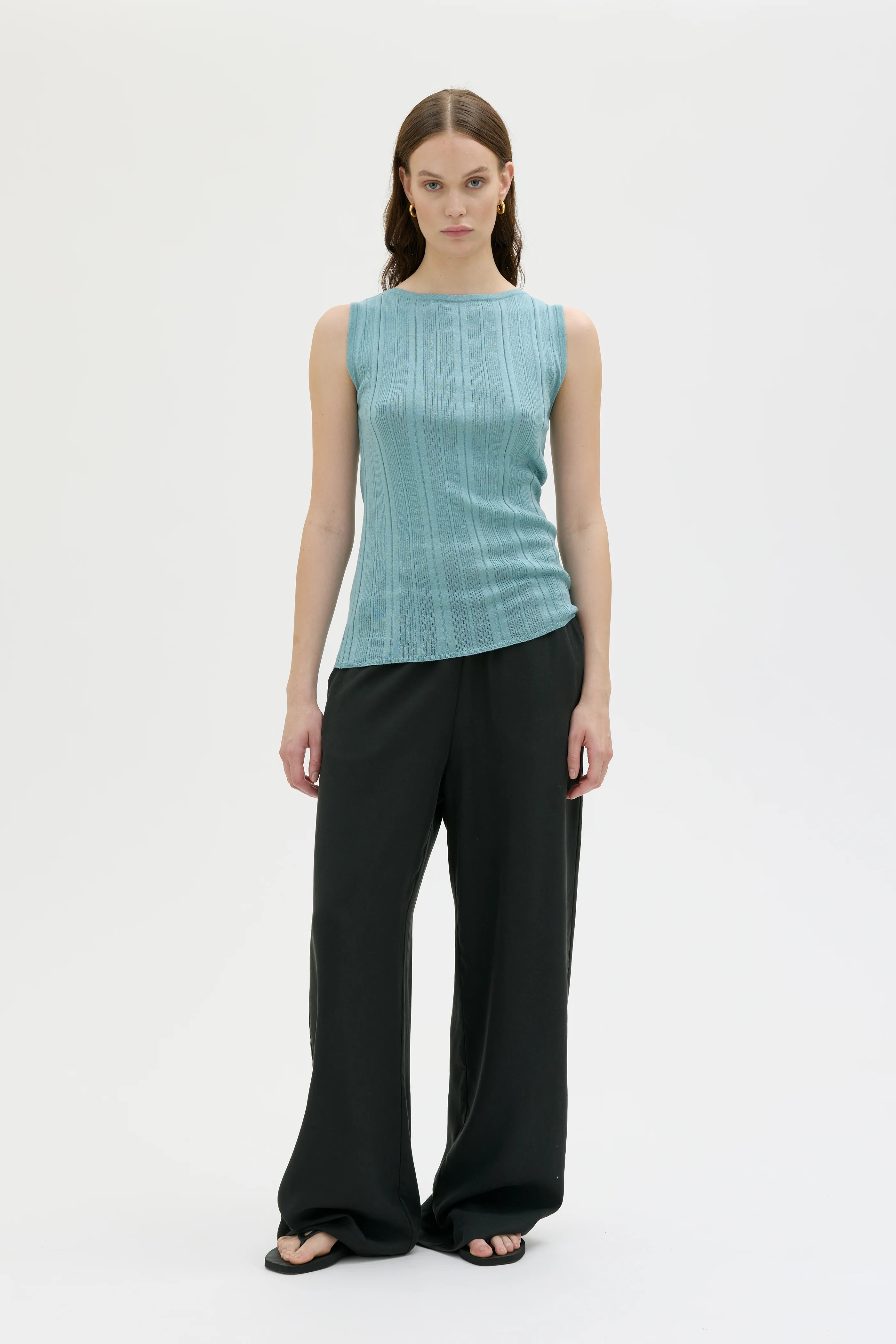 Enni Ribbed Light Organic Cotton Sleeveless Top - Spear Mint Green
Enni ärmlös topp i ribbad lätt ekologisk bomull - Mint grön